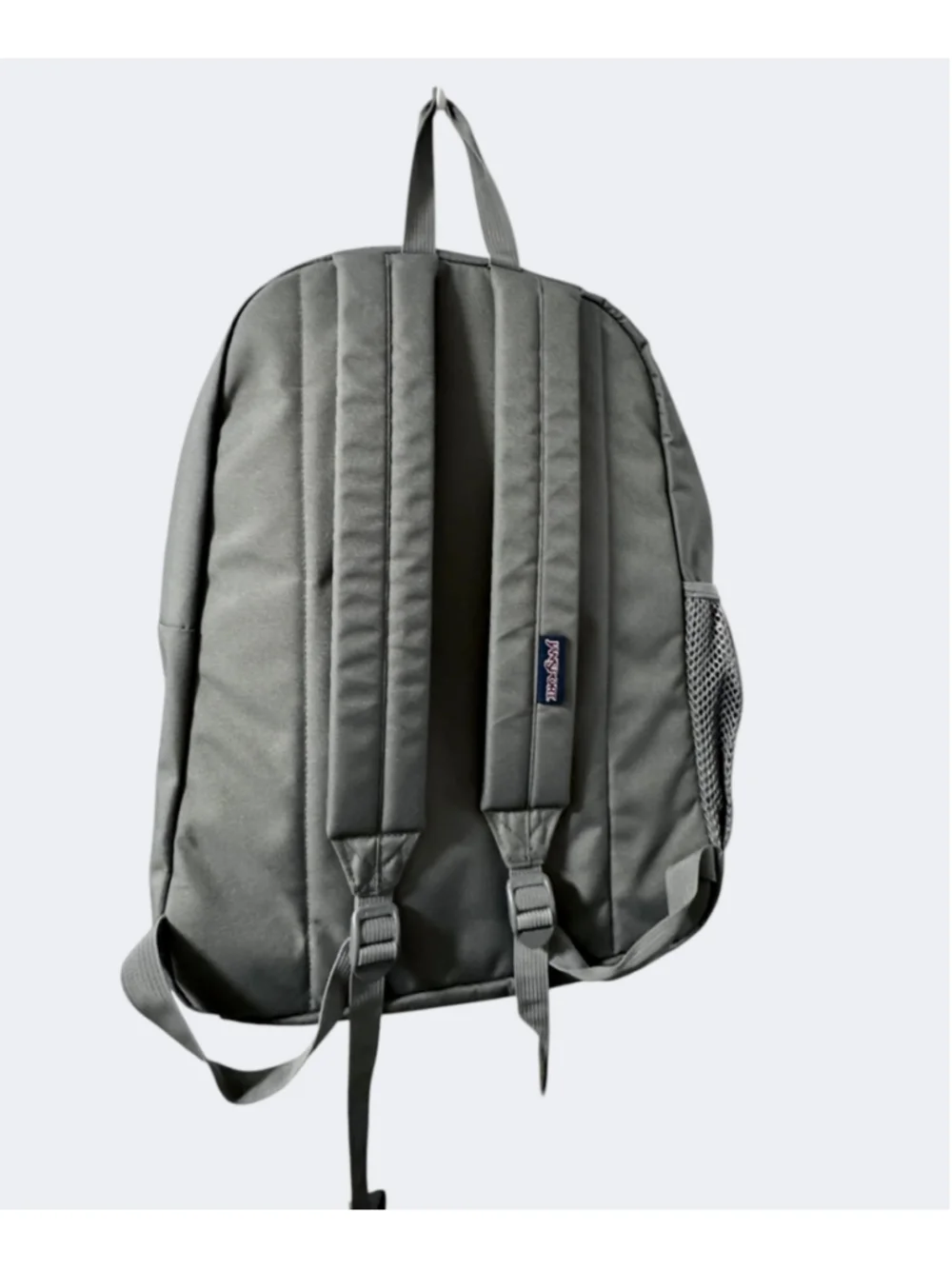 Jansport Grey Backpack with side pocket grey, top zip and front pocket. Light